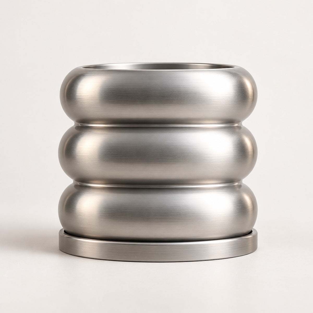 Silver-colored Donut (Bubble) planter with three rounded tiers and a matching drip tray.