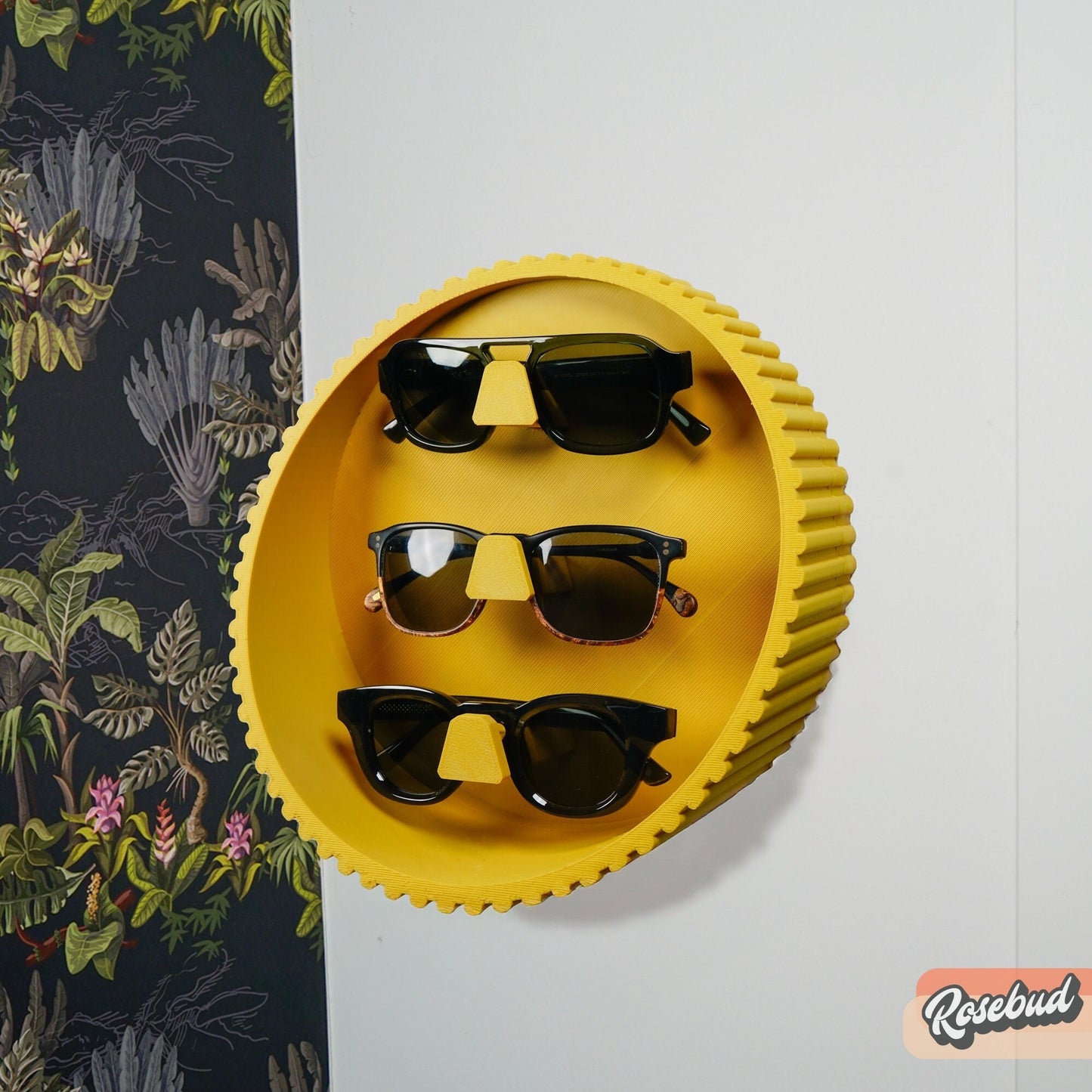 Floating wall shelf in mustard with 3 pegs for displaying eyeglasses and sunglasses