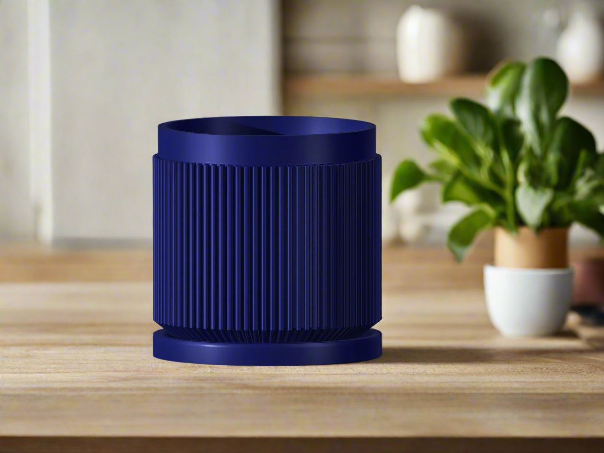 Navy blue plant pot with ribbed design
